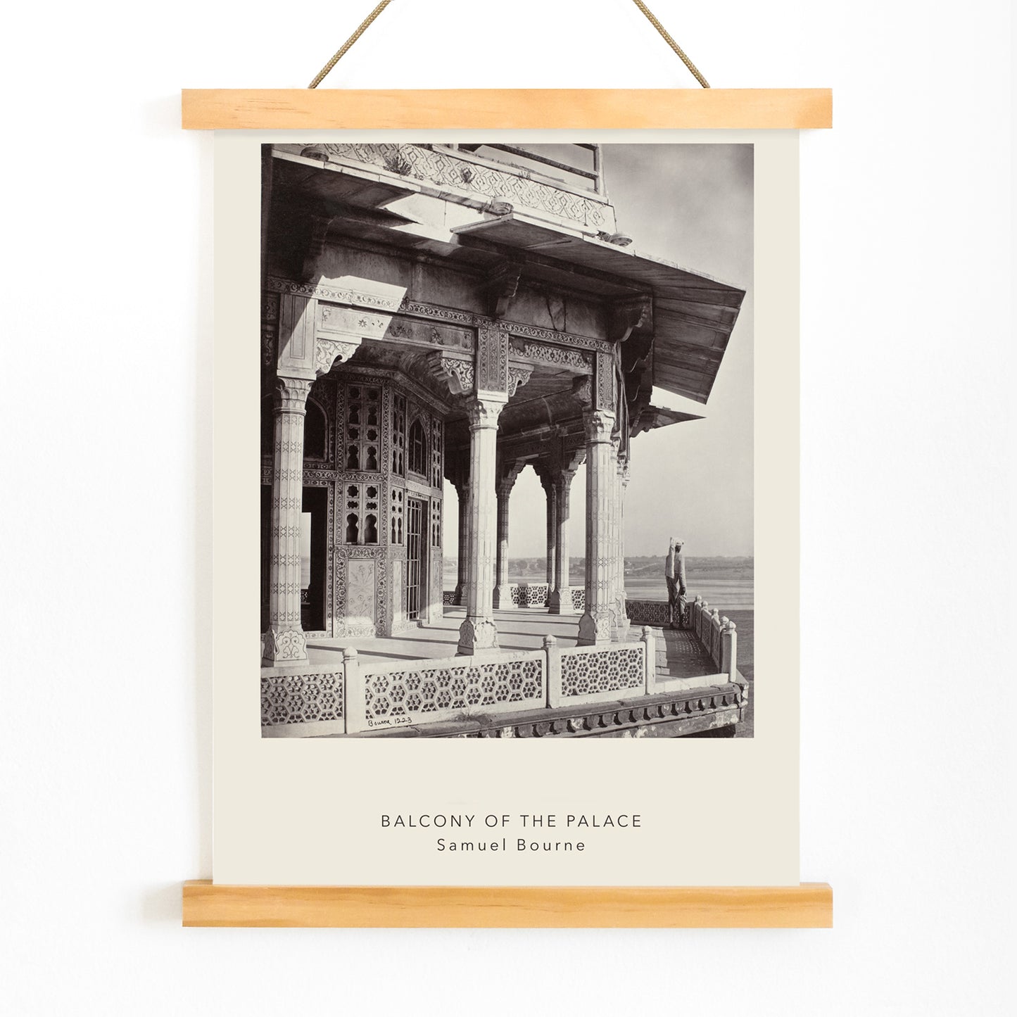 Architectural photography and poster of ornate palace balcony with intricate columns and carvings by Samuel Bourne titled Balcony of the Palace, with wooden magnetic frame on white background