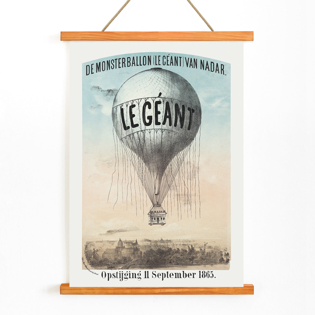 Hot air balloon Le Géant by Nadar Morriën and Amand flying above a cityscape poster titled The Monster Balloon, with wooden magnetic frame on white background