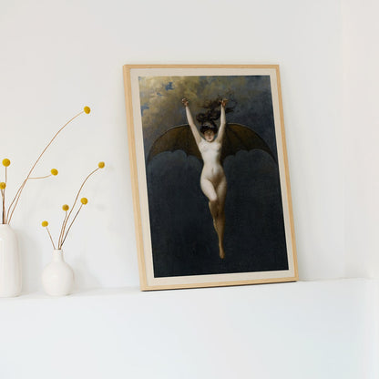 The Bat-Woman by Albert Joseph Penot artwork showing a woman with bat wings against a cloudy dark sky, framed and displayed in modern living room decor