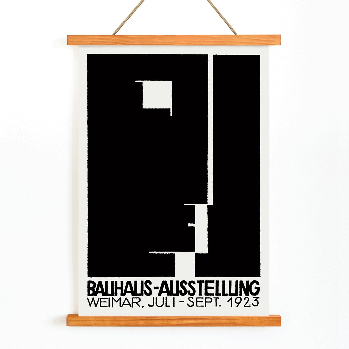 Black and white geometric abstract Bauhaus artwork by Joost Schmidt and László Moholy-Nagy featuring poster design with abstract shapes, with wooden magnetic frame on white background