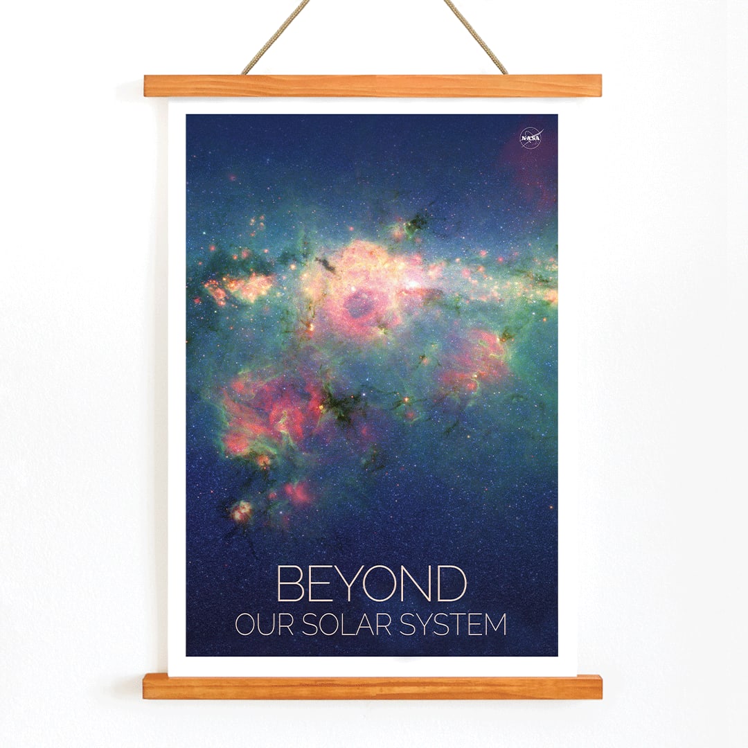 Vibrant nebula poster Beyond Our Solar System by NASA with galaxy background and text, with wooden magnetic frame on white background