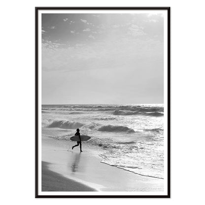 Black and white poster of a surfer with a board entering the ocean titled Surfer in Portugal by artist Black, with black aluminium frame on white background