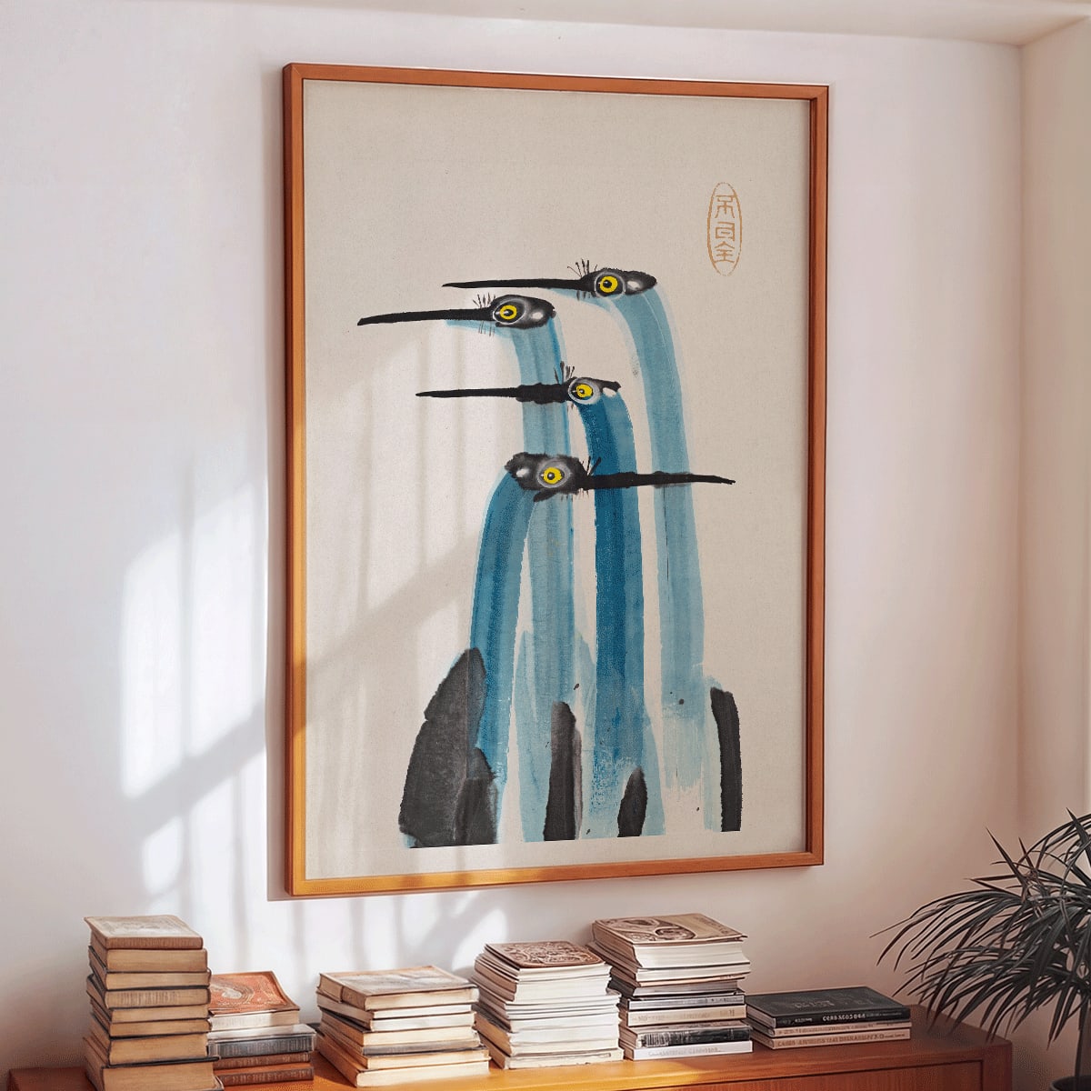 Watercolor painting of three blue cranes titled Blue Japanese Crane by Ohara Koson and Anonymous poster, framed and displayed in home decor