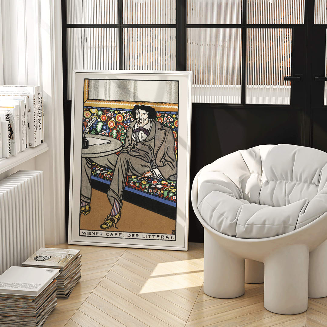 Poster of a man lounging in an ornate Viennese café setting on a floral bench at a table titled Viennese Café The Man of Letters by Moriz Jung, framed and displayed in home decor