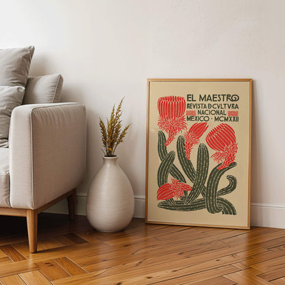 Vibrant cover art of El Maestro Revista de cultura nacional Mexico featuring red flowers and green cacti by Jose Posada, framed and displayed in modern living room decor