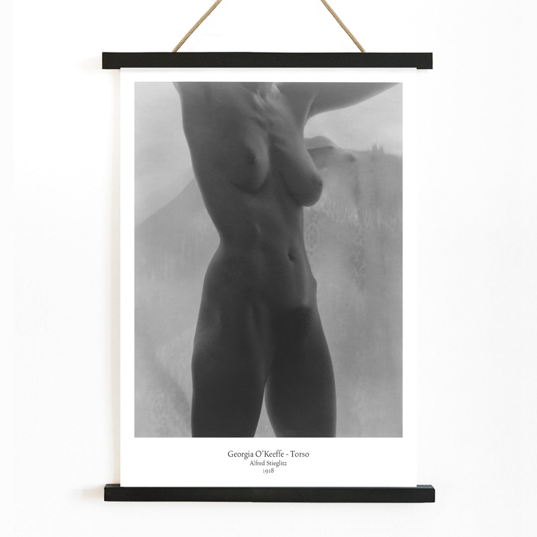 Black and white artistic nude torso photograph of Georgia O Keeffe titled Torso by Alfred Stieglitz poster, with wooden magnetic frame on white background
