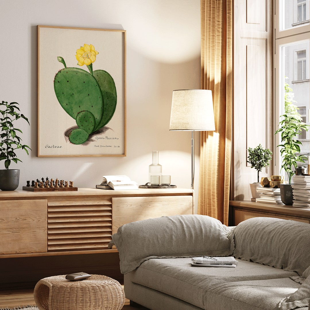 Closeup detail of Indian fig opuntia cactus illustration by Karl Eduard Burger from Familie Der Cacteen showing a green cactus with a yellow flower