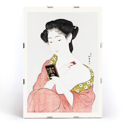 High resolution Japanese art print of a woman in a kimono applying powder by Goyo Hashiguchi titled Woman Applying Powder, framed and displayed in modern living room decor