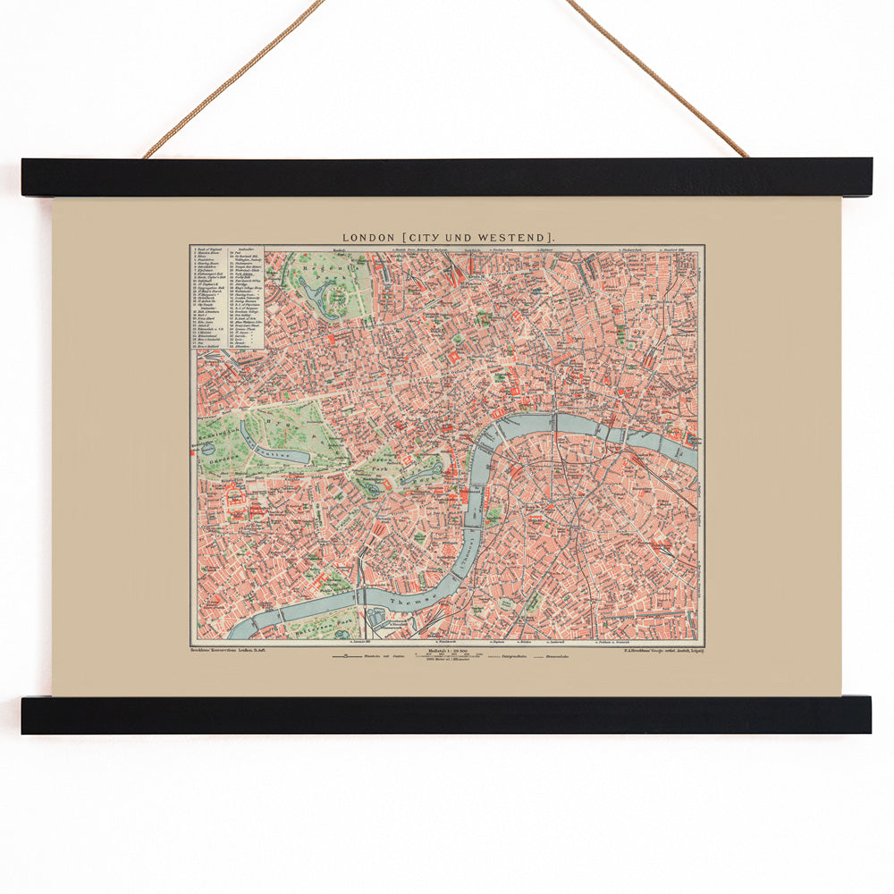 Ancient map of London by Bibliographic institute of Liepzig showing detailed vintage city streets river Thames and parks, with wooden magnetic frame on white background