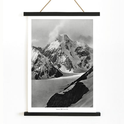 Snow covered mountain landscape by Vittorio Sella Staircase vue prise au dessus du glacier Godwin Austen poster artwork, with wooden magnetic frame on white background