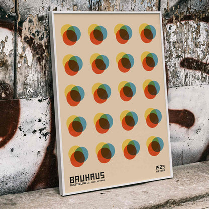 Bauhaus Poster 8 Inspired by the Weimar Exhibition with abstract colorful overlapping circles in a geometric grid pattern, framed and displayed in home decor