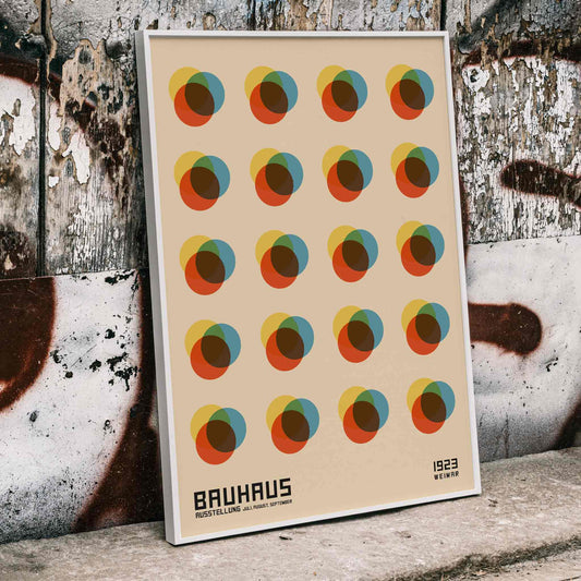 Bauhaus Poster 8 Inspired by the Weimar Exhibition with abstract colorful overlapping circles in a geometric grid pattern, framed and displayed in home decor