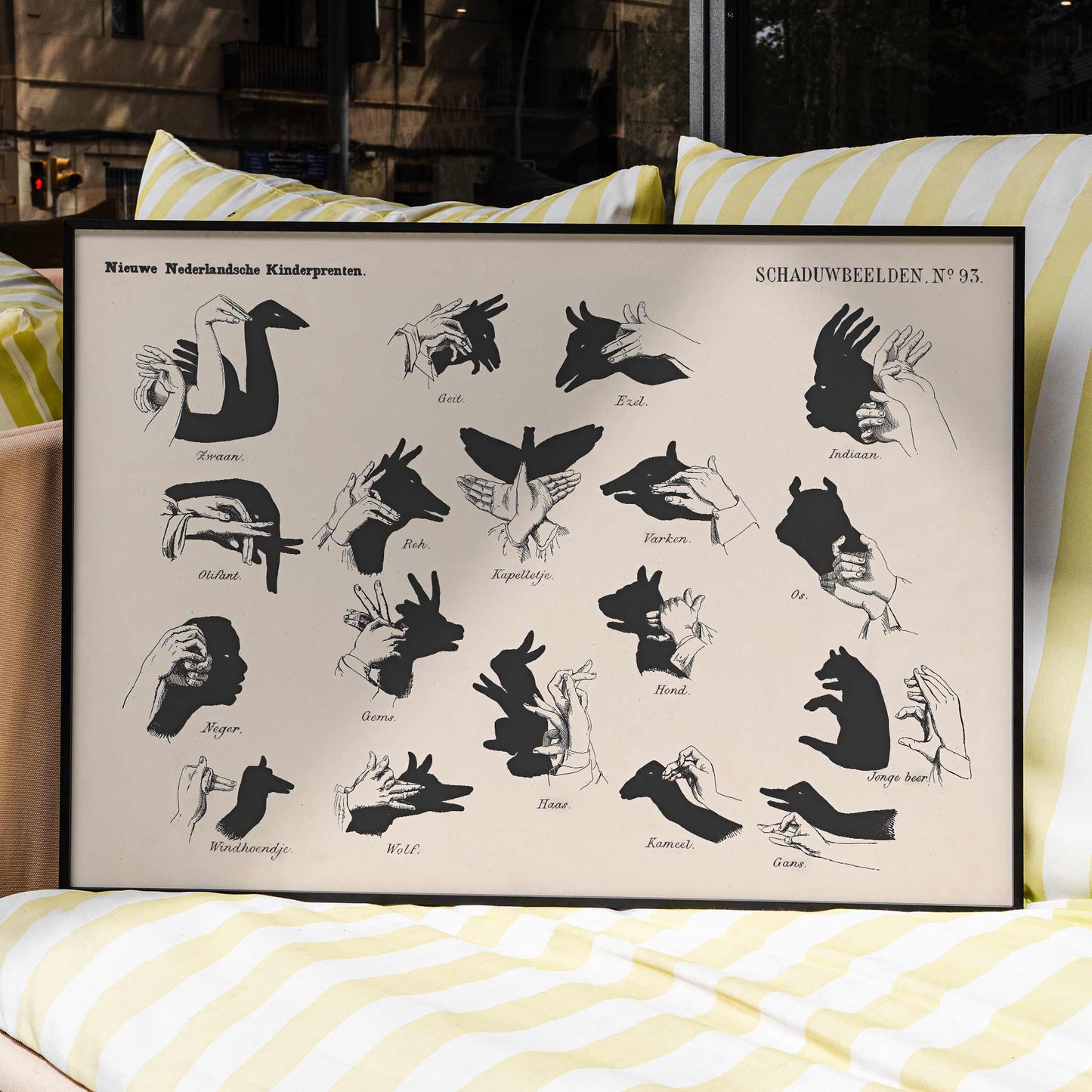 Vintage hand shadow puppet illustrations and animal shapes poster from Shadow Hands by George Lodewijk Funke artwork, framed and displayed in modern living room decor