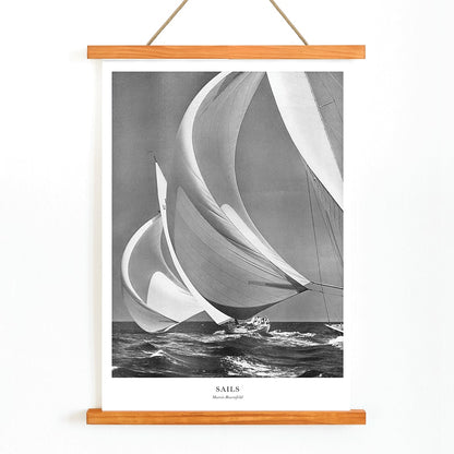Sailing yacht with billowing sails on the open ocean by Morris Rosenfeld titled Sails poster artwork, with wooden magnetic frame on white background