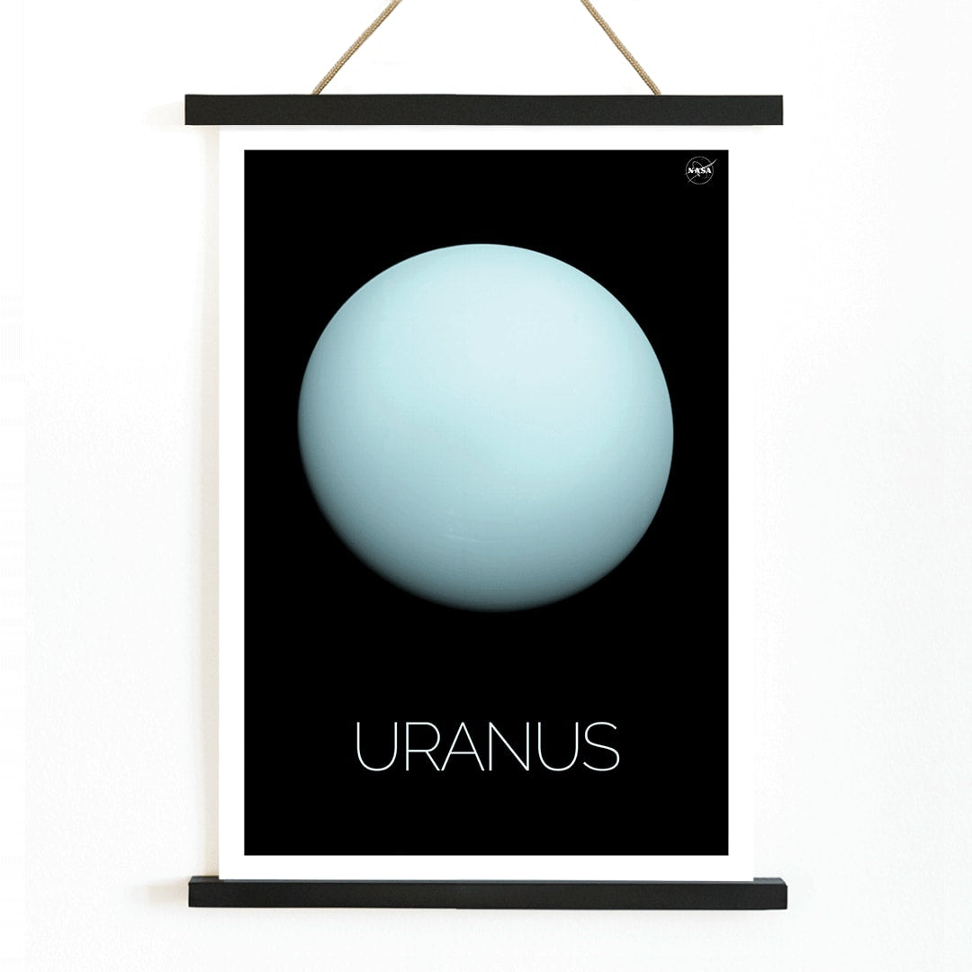 NASA poster of the planet Uranus featuring a light blue sphere against a black background with the title Uranus, with wooden magnetic frame on white background