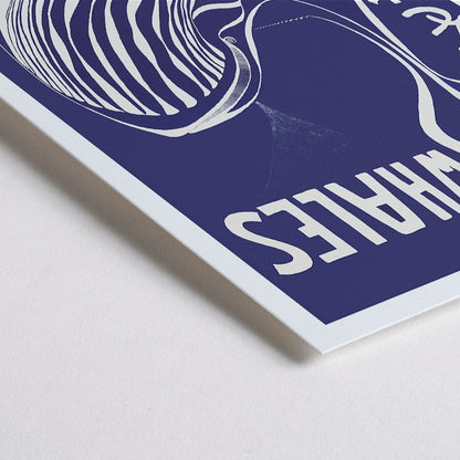 Closeup detail of Save the Whales poster by Lawrence Vint featuring a stylized white whale and multilingual save the whales message on blue background