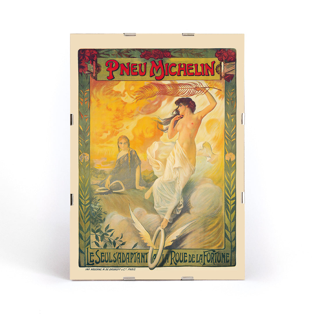 Vintage Michelin tire advertisement by Edouard Michelin featuring women artistic flourishes flowing fabric palm leaf and winged tire Pneu Michelin poster artwork, framed and displayed in modern living room decor